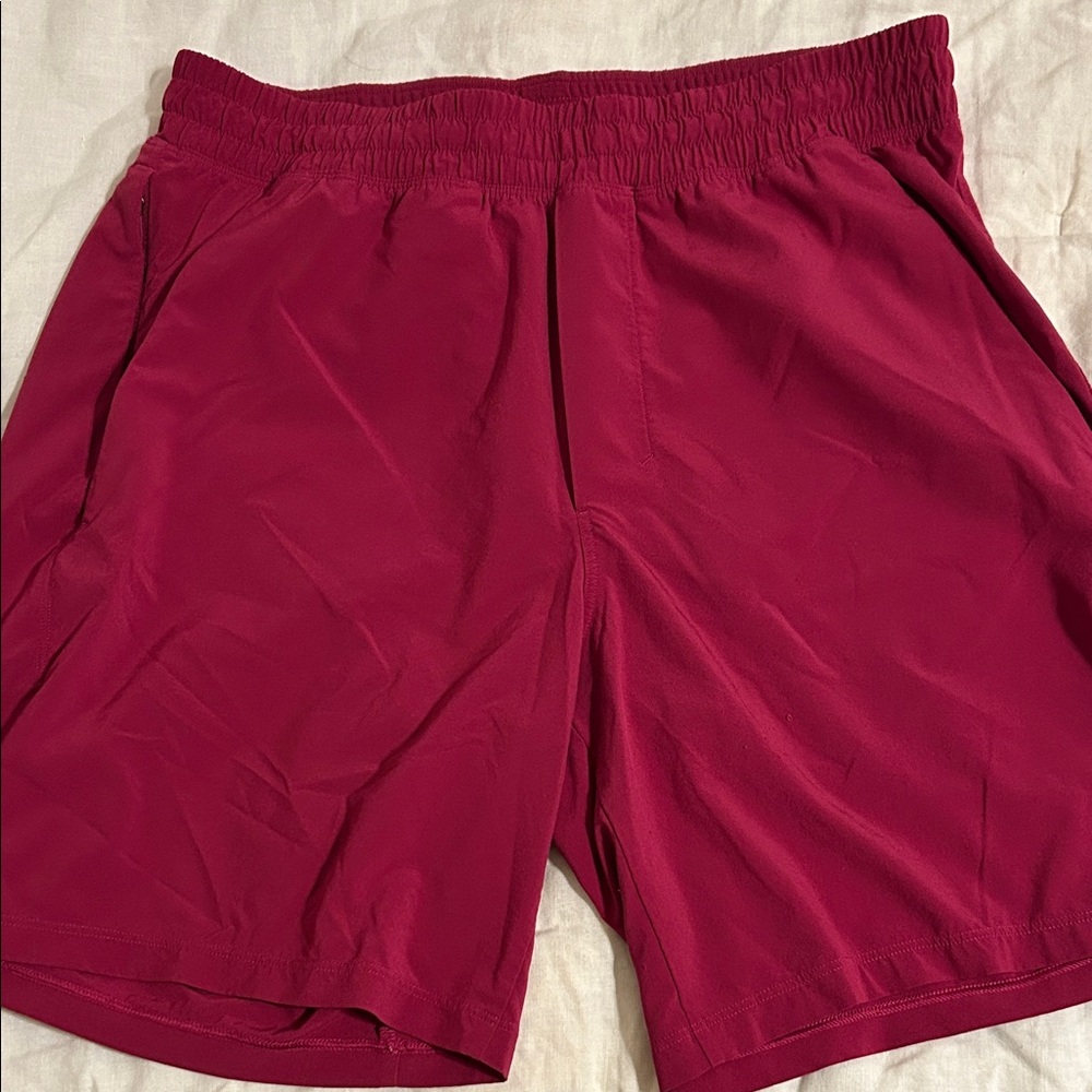 lululemon athletica Men's Pace Breaker Running Shorts in magenta